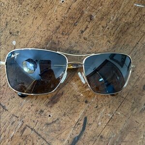 Maui Jim Gold Frame Sunglasses with Dark Lenses